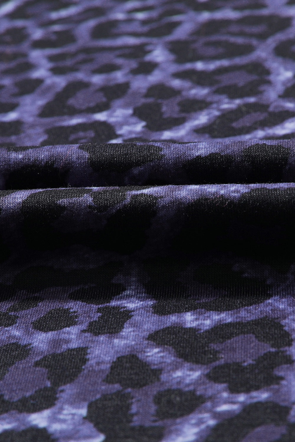 WILD LIKE THE WEST Graphic Leopard T-Shirt.