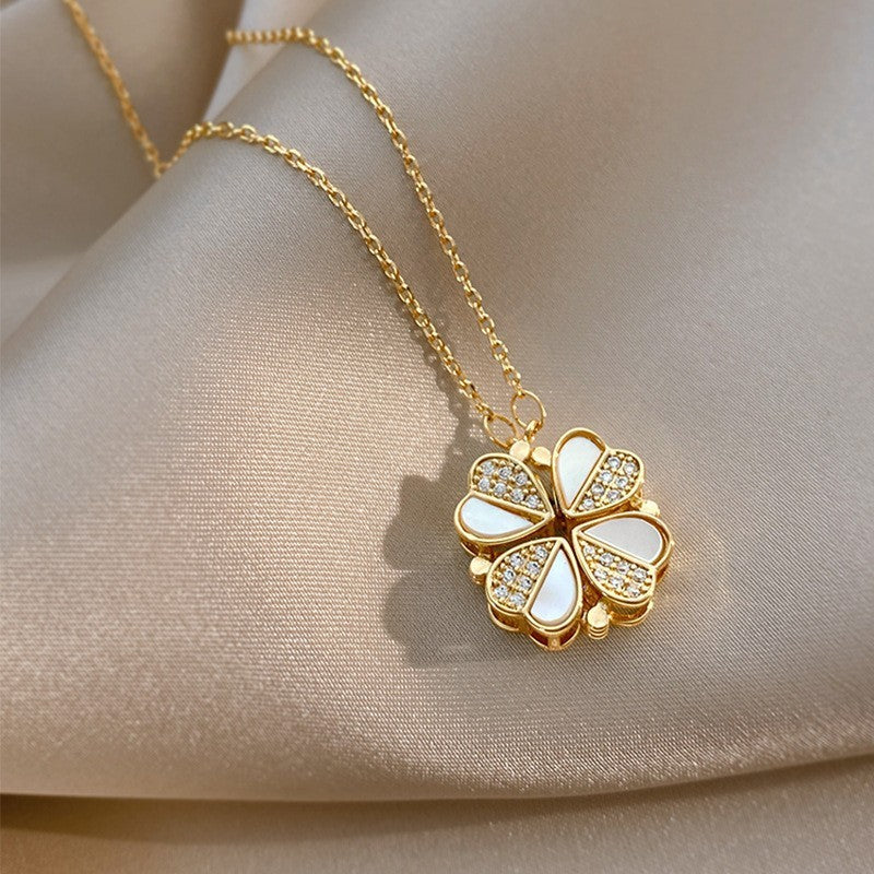 Elegant Four-Leaf Clover Pendant Necklace: Stainless Steel Design with Crystal Heart – A Perfect Luxury Gift for Women Seeking Timeless Style.
