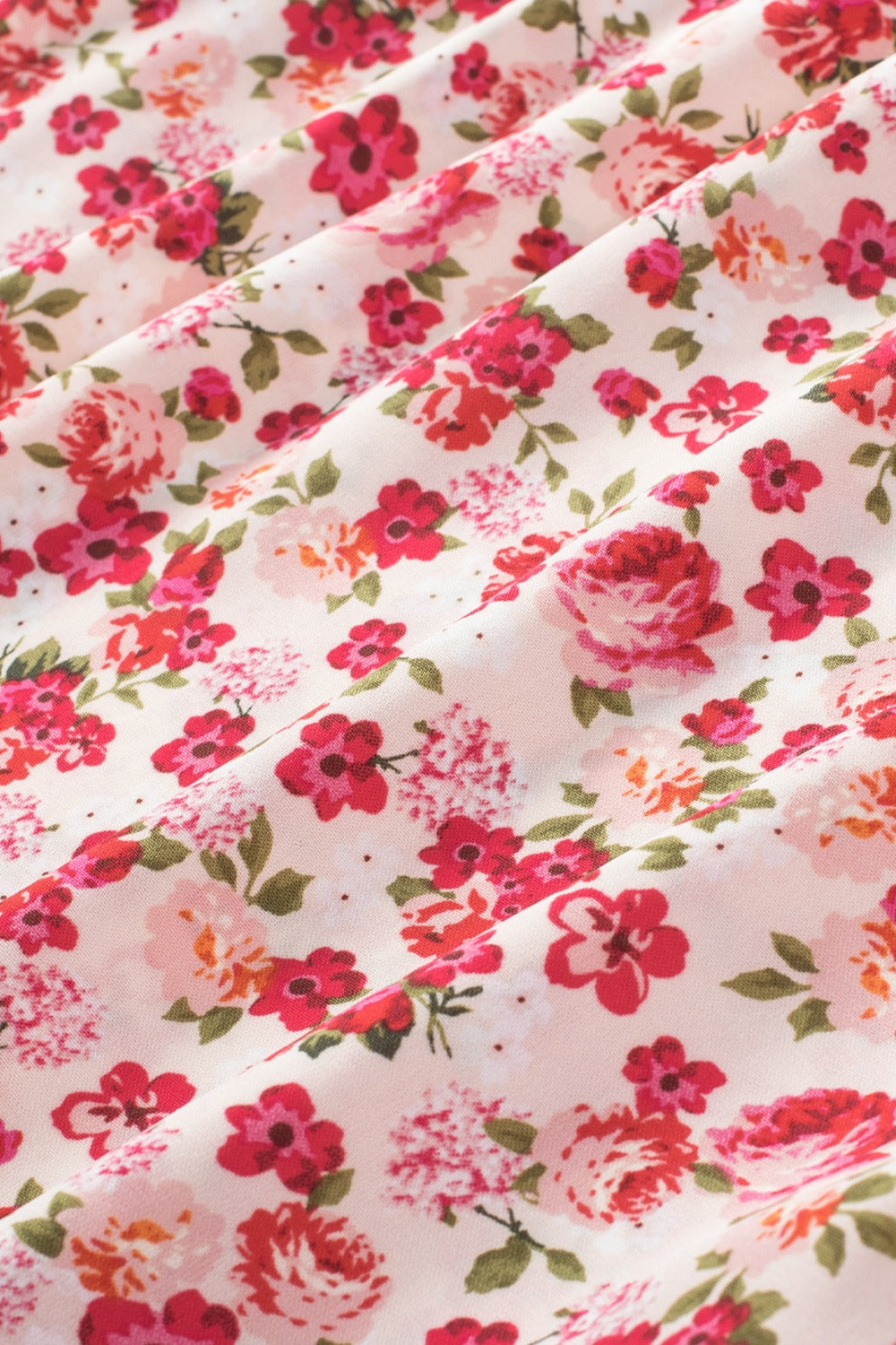 Ruffled Floral Round Neck Cap Sleeve Blouse.