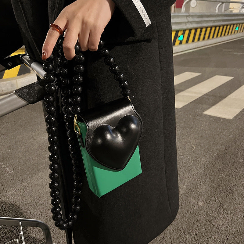 The New Checkerboard Mobile Phone Bag Shoulder Messenger Lady.