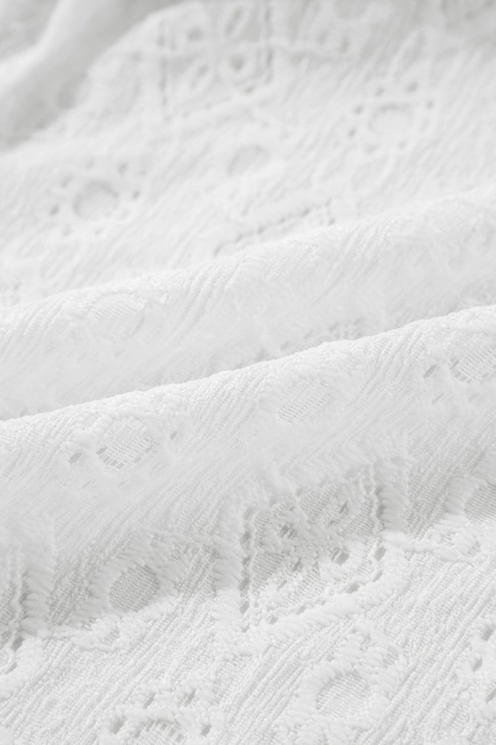 Lace Sleeveless Tied Waist Mini Dress.