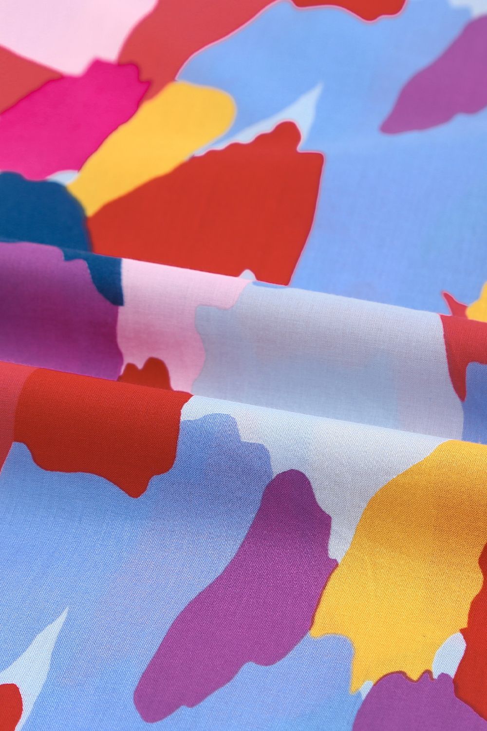 Frill Printed Mock Neck Cap Sleeve Blouse.