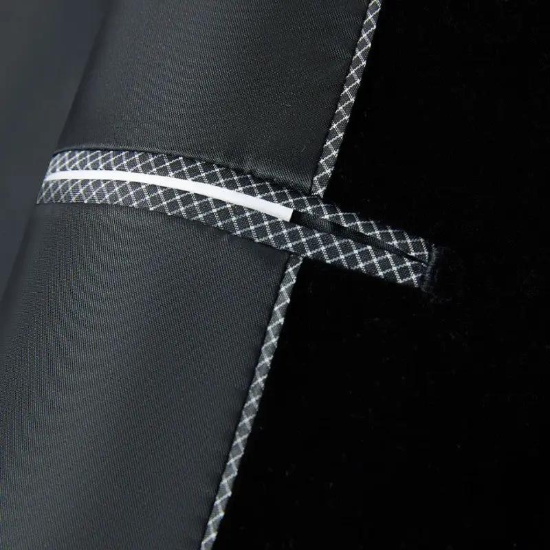 This slim-fit blazer, adorned with gold and silver sequins, features a sleek, single-button closure and a sophisticated satin shawl lapel. A&S Collection