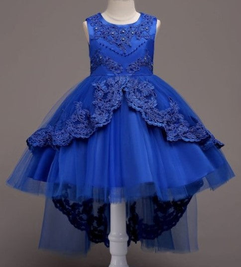 Elegant white flower girl dress with intricate lace and high-low hem. A&S Collection