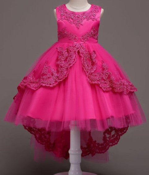 Elegant white flower girl dress with intricate lace and high-low hem. A&S Collection