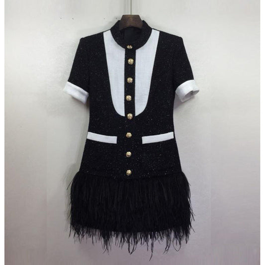 Europe and The United States autumn winter star women fashion metal buckle black and white clash-color hem stitching feather dress A&S Collection