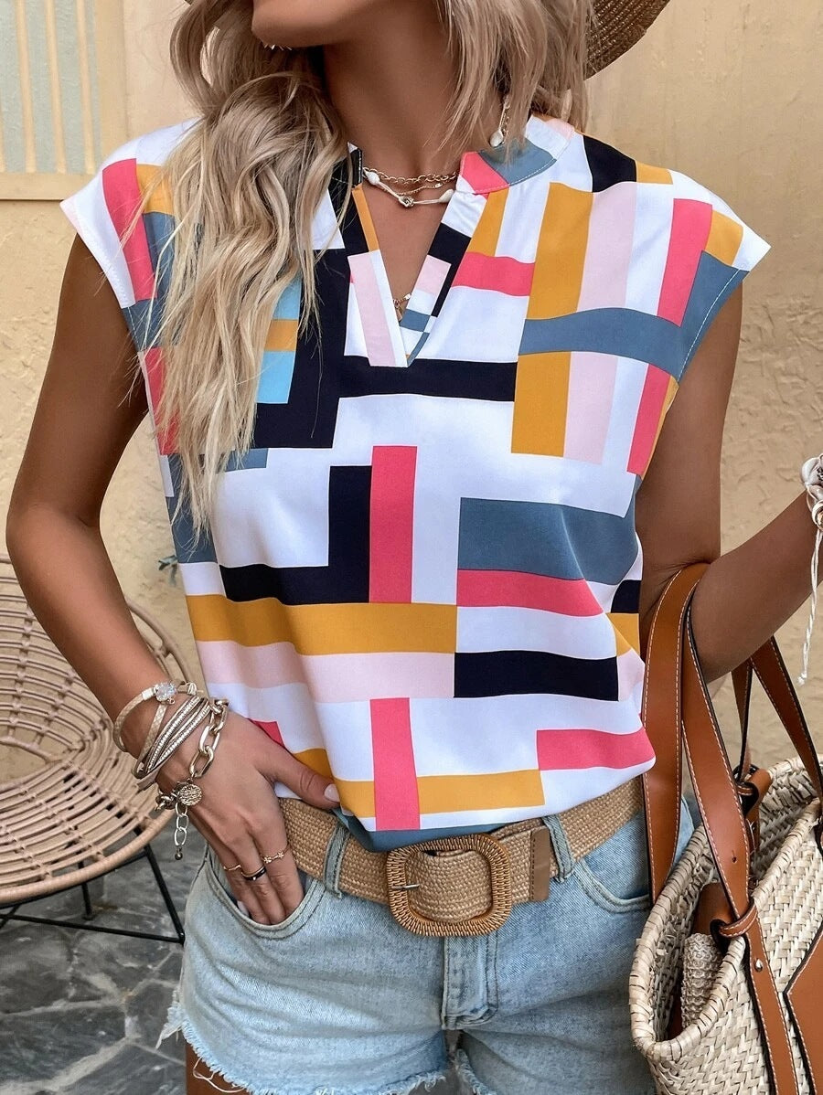 **Chic digital print top—feminine charm meets modern elegance.** CJ