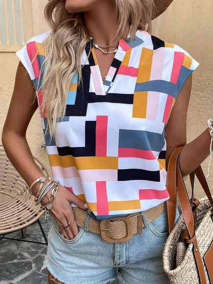 **Chic digital print top—feminine charm meets modern elegance.** CJ