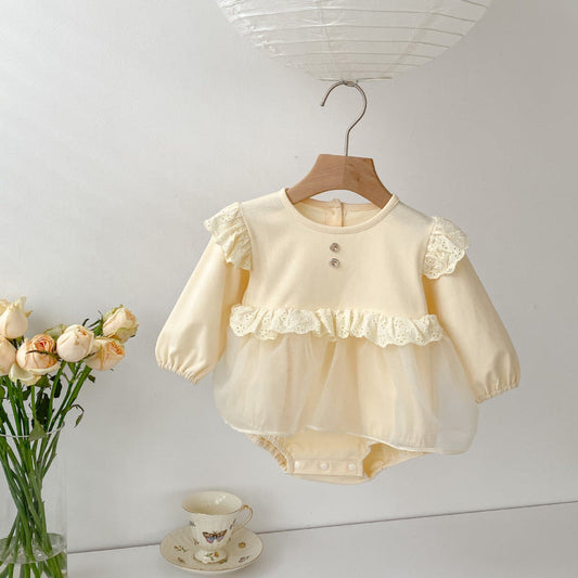 Cream baby romper with lace ruffles, two chest buttons, and a tulle overlay skirt, perfect for special occasions A&S Collection