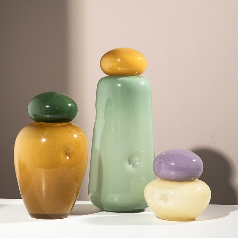 Charming candy ribbon vases—graceful accents for your home. CJ
