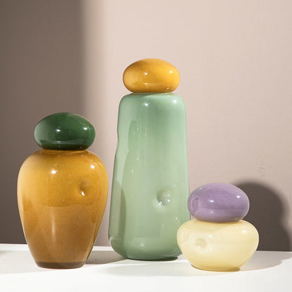 Charming candy ribbon vases—graceful accents for your home. CJ