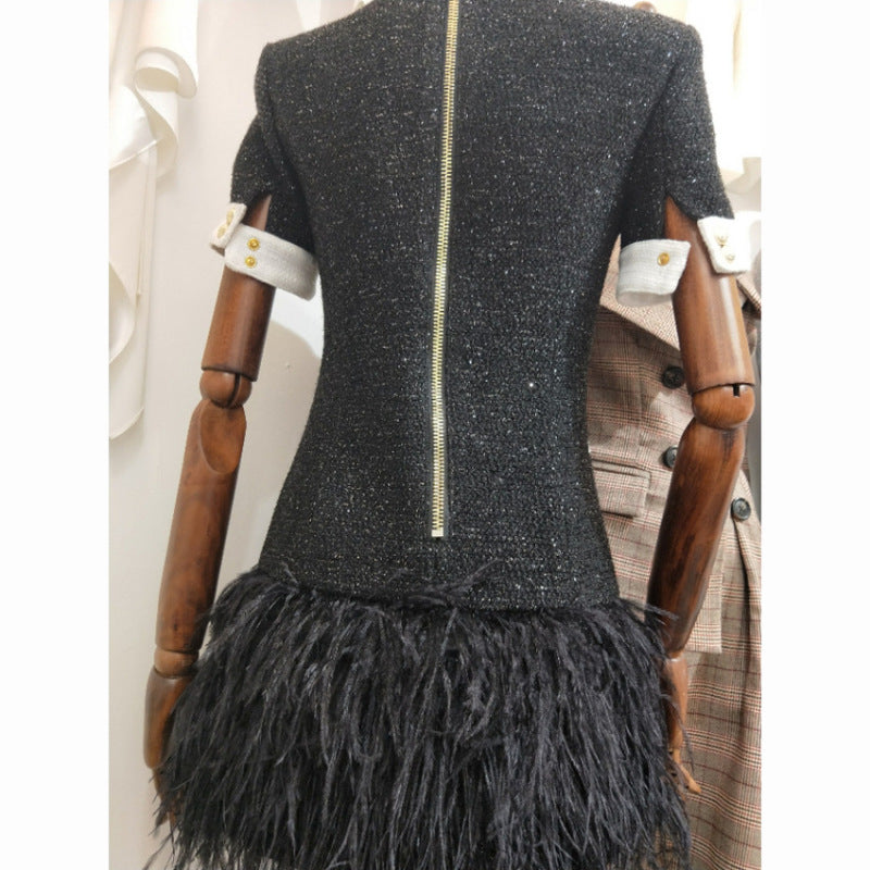 Europe and The United States autumn winter star women fashion metal buckle black and white clash-color hem stitching feather dress A&S Collection