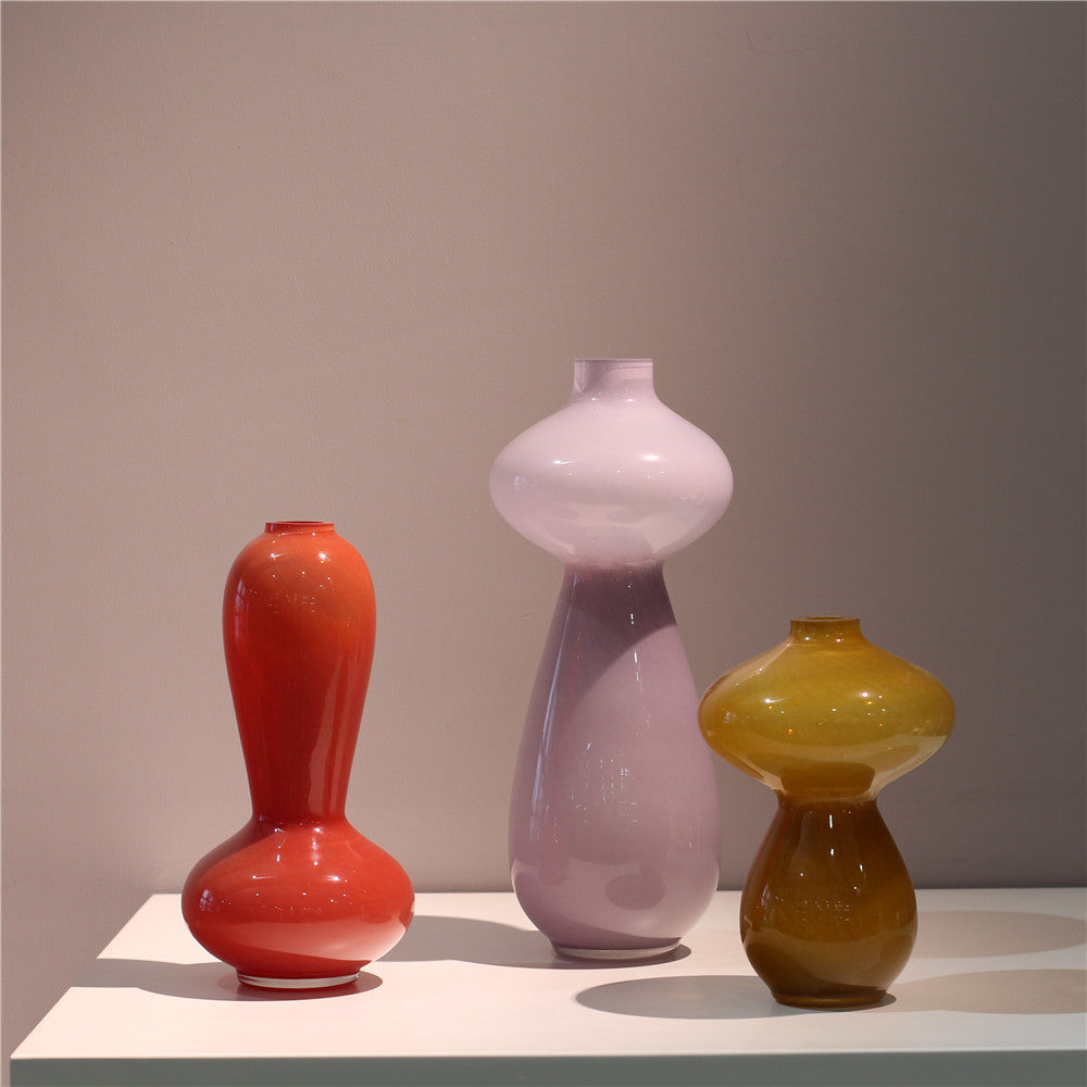 Elegant caramel glass vases—sophistication for any space. CJ