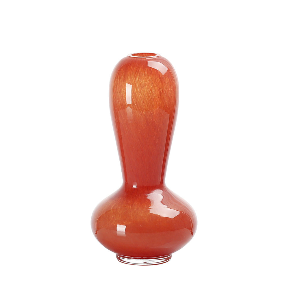 Elegant caramel glass vases—sophistication for any space. CJ