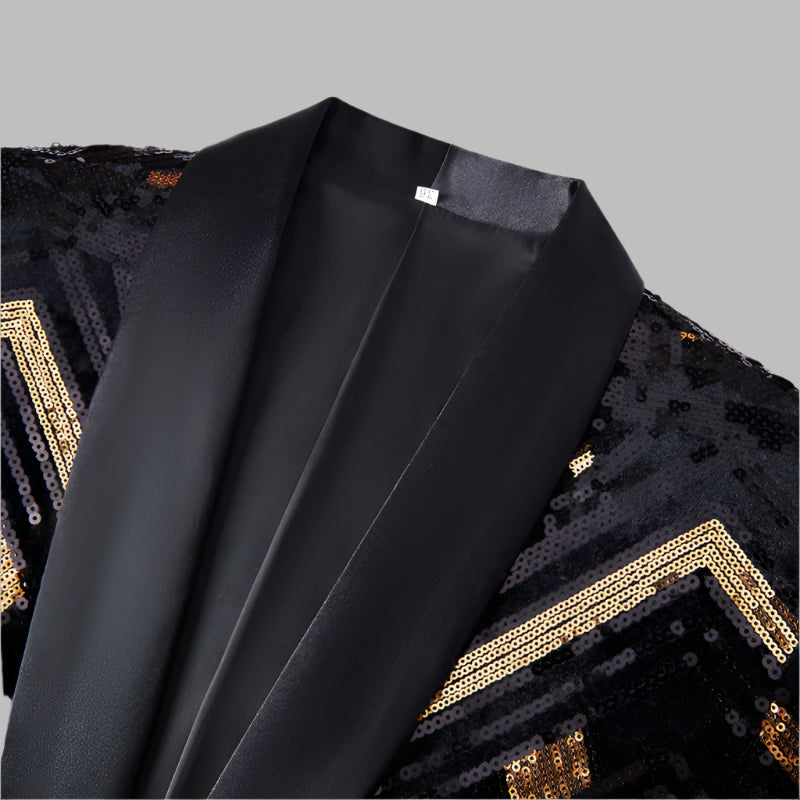 This slim-fit blazer, adorned with gold and silver sequins, features a sleek, single-button closure and a sophisticated satin shawl lapel. A&S Collection