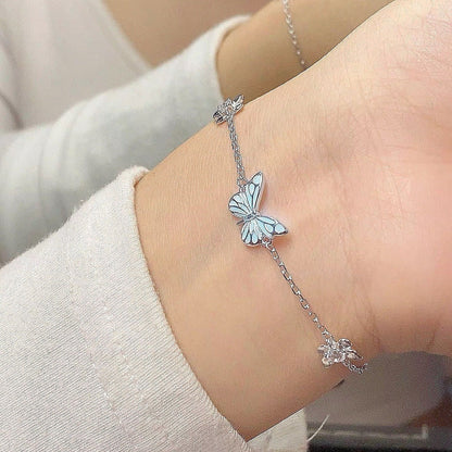 Glow-in-the-Dark Luminous Butterfly Jewelry Set: Stunning Blue Necklace and Bracelet Combo – Perfect Clavicle Chain Choker for Women’s Parties and Gifts" CJ