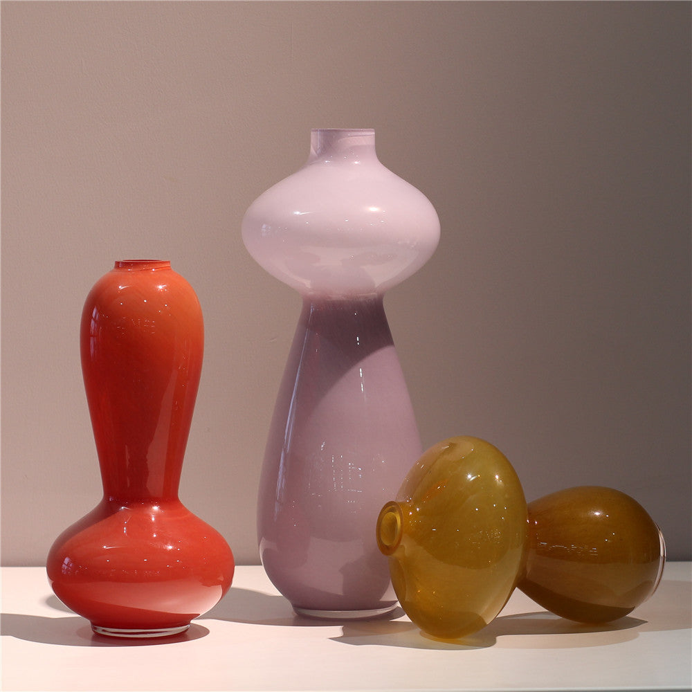 Elegant caramel glass vases—sophistication for any space. CJ