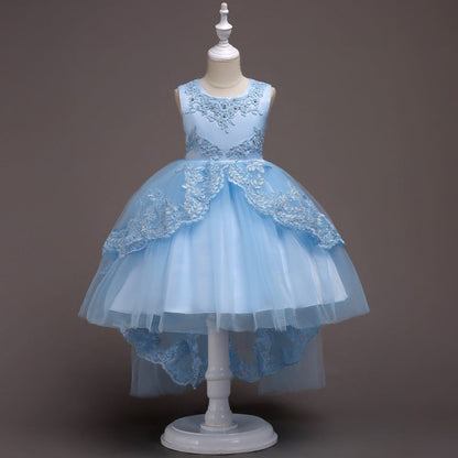 Elegant white flower girl dress with intricate lace and high-low hem. A&S Collection