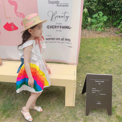 Vibrant rainbow dress with a pink bow, perfect for brightening any child's wardrobe. A&S Collection