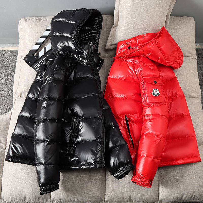 This vibrant red down jacket is designed for winter, featuring a thick, insulated hood and stylish printed logo for a fashionable and warm outdoor look A&S Collection