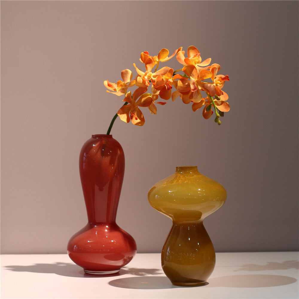 Elegant caramel glass vases—sophistication for any space. CJ
