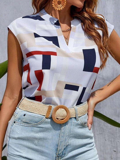 **Chic digital print top—feminine charm meets modern elegance.** CJ
