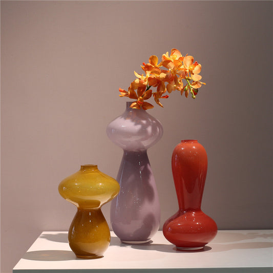 Elegant caramel glass vases—sophistication for any space. CJ