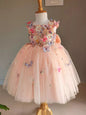 Elegant peach flower girl dress with butterfly and floral embellishments. A&S Collection