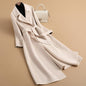 Elegant mid-length Herben-style cashmere coat, perfect for chic autumn and winter fashion." A&S Collection