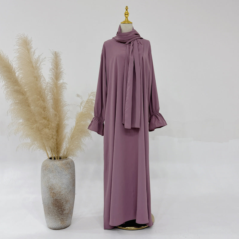 All flared sleeve dress- This elegant, long-sleeved dress features a sophisticated high neck with a draped scarf detail, perfect for a refined look. A&S Collection