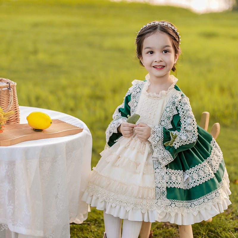 Charming Victorian-style dress with green and white lace and intricate bows. A&S Collection