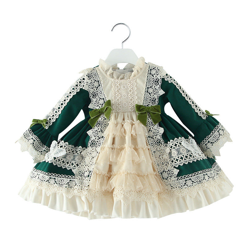 Charming Victorian-style dress with green and white lace and intricate bows. A&S Collection