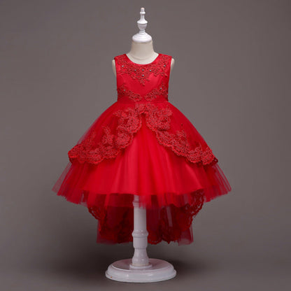 Elegant white flower girl dress with intricate lace and high-low hem. A&S Collection