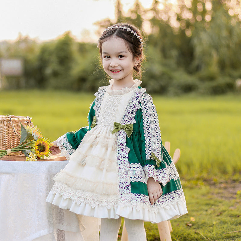 Charming Victorian-style dress with green and white lace and intricate bows. A&S Collection
